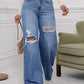💃 High-Waisted Ripped Wide-Leg Jeans – Designed to elongate the legs and flatter the waist. A loose, relaxed fit through the hip and thigh with a gentle distressed finish. Button fly, floor-skimming hem & effortless cool for every body shape 🌸